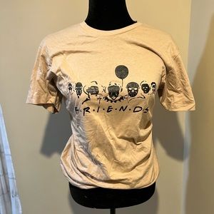 Tan with black decals “friends” Halloween tee shirt